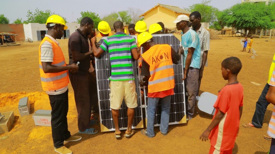 Locals are taught how to install solar panels.