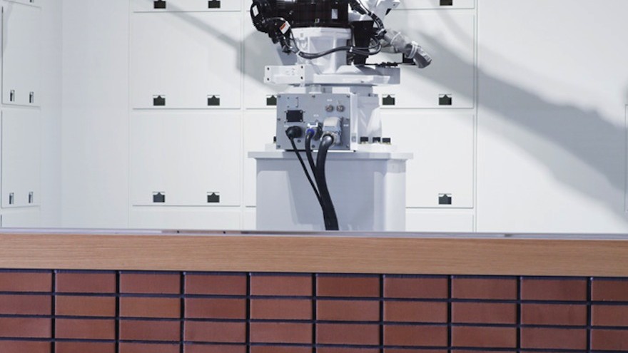 The locker room is manned by an advanced robot lever