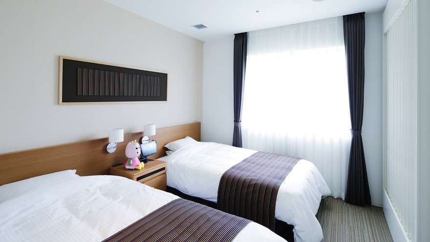 Rooms at the Henn Ha Hotel have small robots next to the beds who you can ask to wake you up
