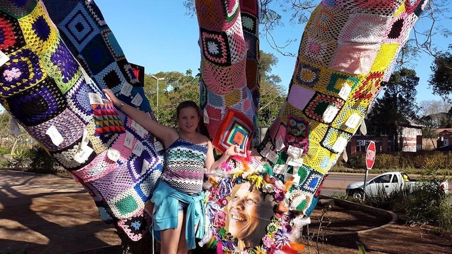 Woza Moya yarn-bombed a huge Jacaranda Tree outside the premises of the Hillcrest AIDS Centre Trust to raise awareness and funds for their Respite Unit on Mandela Day
