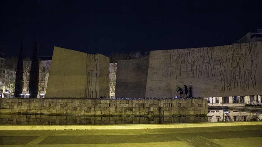 The anonymous group sets up their display at Colombus Square