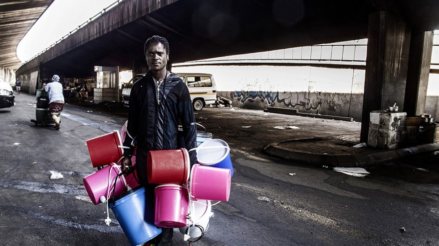 Taxi rank. "Wake up, This is Joburg" is a series of 10 books that tells the stories of the peculiar urban inhabitants of Johannesburg. Image: Mark Lewis