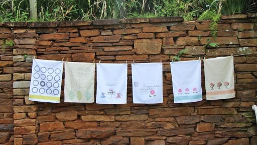 South African artist Sue Sylvester creates hand-painted fabrics inspired by a love of her home