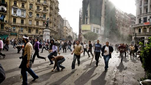 Guy Martin captured the turmoil surrounding the Egyptian protests of 2011. 