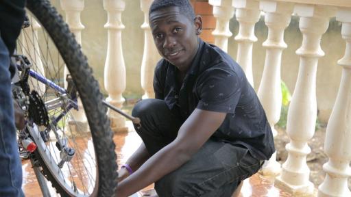 Elliot Mwebaze has developed a device that enables phones to charge using a bicycle dynamo
