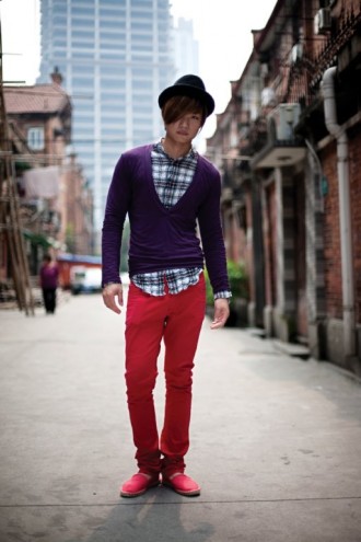 A trendy young man photographed in Huai Hai Fang, an old lane house compound off