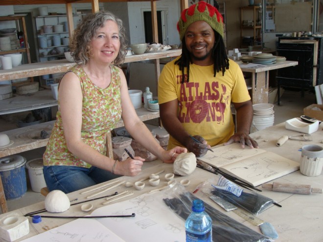 Sarah Rhodes and Andile Dyalvane at work 