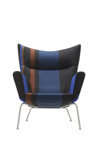 Paul Smith redesigns Carl Hansen & Son's iconic Shell Chair in collaboration with Maharam. 