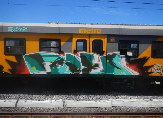 A "toe panel" on a Metro train featured in Matthew Olckers' book 'Painting Cape Town: Graffiti from South Africa'. 