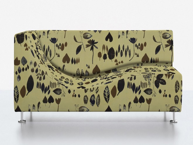 Couch covered in Foliage.