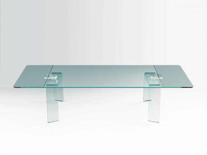The Kayo Extensible Table fo FIAM, made of glass, has a discreet and innovative extendable mechanism embedded in its bent glass legs.