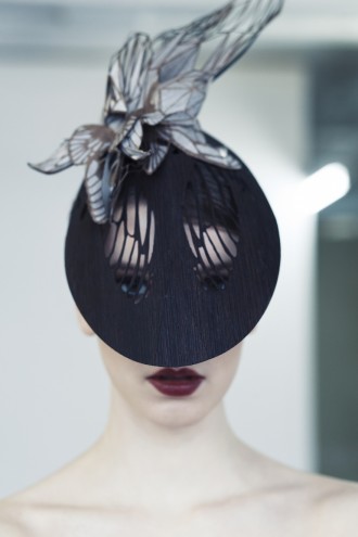 Elegant and finely crafted hat design by Emma Yeo