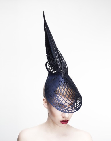 Sculpted out of wood, Emma Yeo's couture headwear makes a dramatic fashion statement