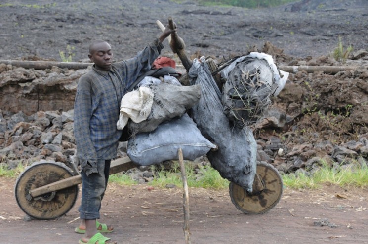 In eastern Congo, hand-hewn, low-tech scooters called chukudu's are a used to carry heaps of cargo, from food to fuel to bricks, across long distances. Image: Teon Voesen