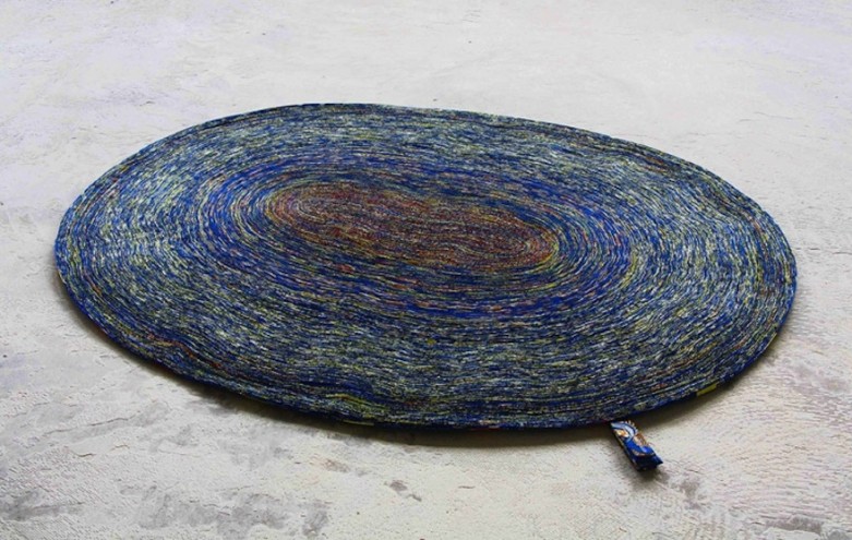 Design Academy Eindhoven graduate Simone Post is giving new life to the discarded wax prints from Vlisco by designing a series of interior products. 