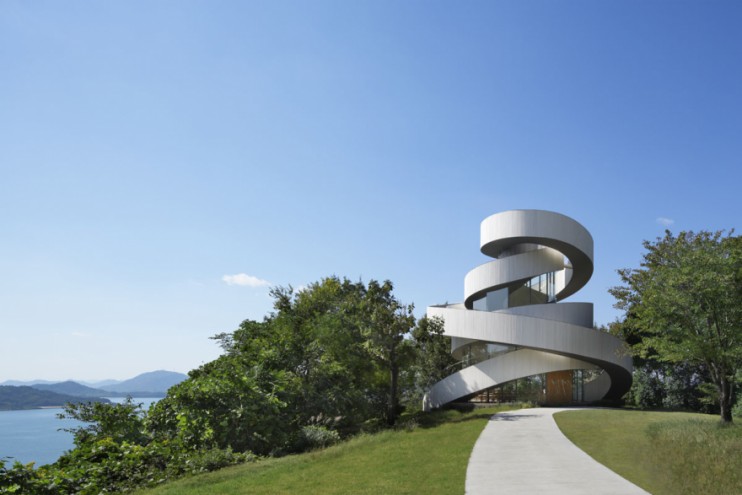 Japanese architect Hiroshi Nakamura designed the Ribbon Chapel – a structure wrapped in double spiral stairways with striking views of the ocean and islands.