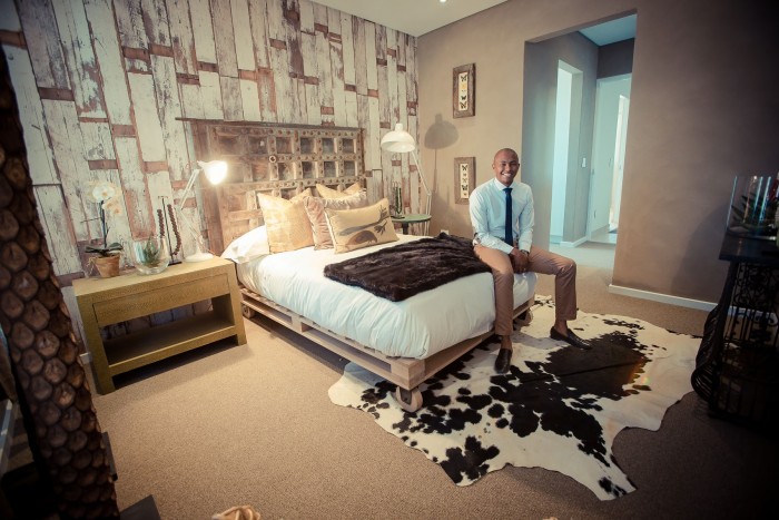 2015 Emerging Creative Jason Sandows pictured alongside his interior design for an apartment on the luxury economic estate of Steyn City. The project was part of SABC 3's "Win a Home" competition. 2015 Emerging Creative Jason Sandows.