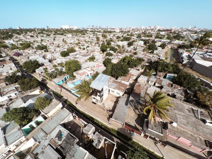 Casas Melhoradas, a double storey, low-cost house by Architects Without Borders, reinterprets Mozambique’s traditional corrugated iron and wood homes.