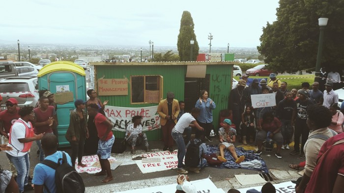 Students erect a shack on the steps of UCT