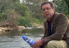 Professor Eugene Cloete with tea bag water filter. Professor Eugene Cloete with tea bag water filter.