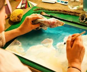 Local artist Euodia Roets handpaints her designs for her brand Touchee Feelee.