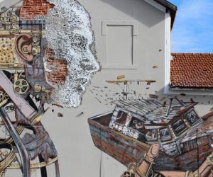Vhils & Pixelpancho collab in Lisbon