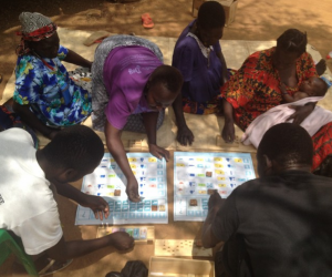 As Africa’s poorest go from aid to trade, Design without Borders and the UN’s World Food programme are helping a group of Ugandans to become truly self-reliant with the Aki Financial Literacy kit.