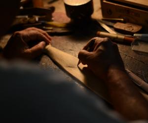 A retired musician in West Bengal, India created this artisanal, folding wooden tie