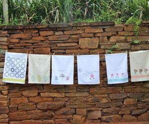 South African artist Sue Sylvester creates hand-painted fabrics inspired by a love of her home