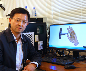 hand-worn robotic device to help the blind