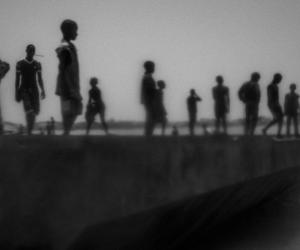 Runaway talibes stand on the bank of Senegal river, in Saint Louis city, north of Senegal, May 20, 2015. 