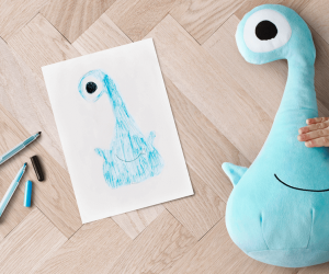 Blue monster with original drawing