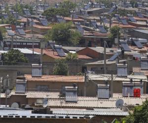 Solar panels in Alexandra, Johannesburg. KIM LUDBROOK/EPA