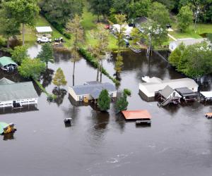 An aerial view taken from a Coast Guard helicopter showing the continuing effects of flooding caused by Hurricane Joaquin in the area of the Black River, in Sumpter County, S.C., Oct. 6, 2015. U.S. Coast Guard photo by Petty Officer 1st Class Stephen Lehmann