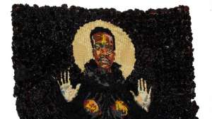 Uzukile the Elder made from wool, thread, artificial flowers and spray paint on tapestry canvas. 2013 Image: WHATIFTHEWORLD. 