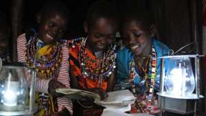 Children reading by Evans Wadongo's Mwangabora light. 