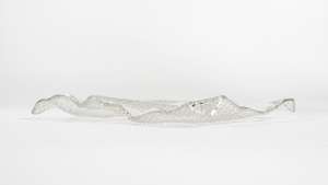 Studio MeDa makes a glass plate inspired by bubble wrap. Images: Studio Meddle