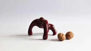 According to its creator NikyNaky, this ceramic Macaco paperweight just wants to be loved