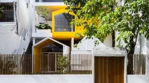 Kientru O Architects converted this building from an old townhouse into a vibrant ochre-and-yellow themed nursery school. 