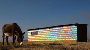 South African-based artist r1 used 1000 recycled CDs to clad an abandoned farmhouse in Randfontein, a mining city in western Gauteng. 
