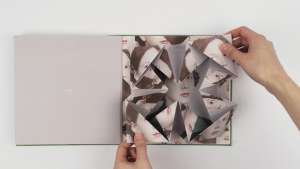 Cosmic Surgery combines photography and the delicate art of origami 