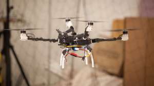 A four-rotor "bunnycopter" developed at MIT's Computer Science and Artificial Intelligence Laboratory features propellers at different heights.  Photo: Jason Dorfman/MIT CSAIL